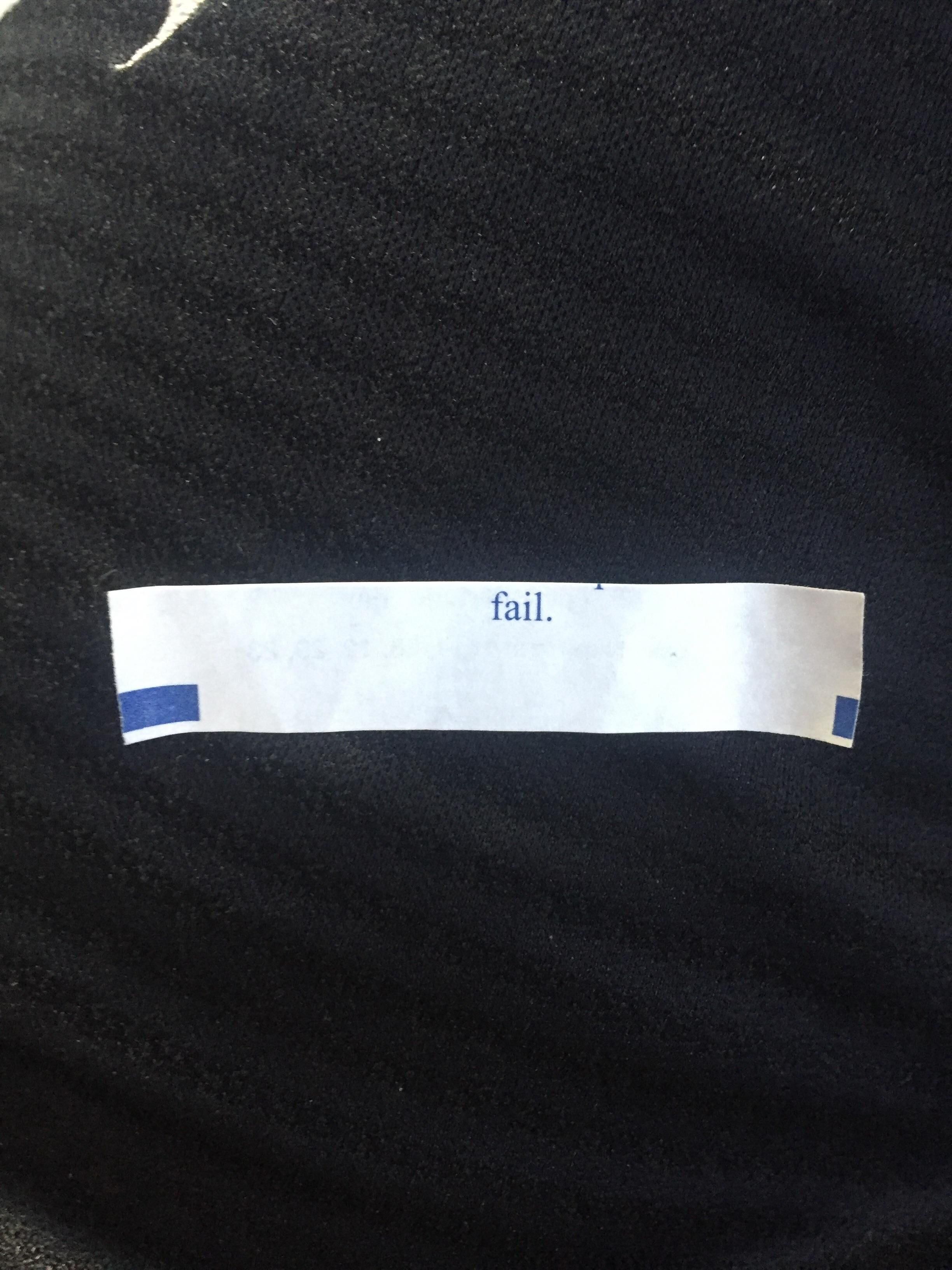 My dads fortune cookie paper has misaligned print