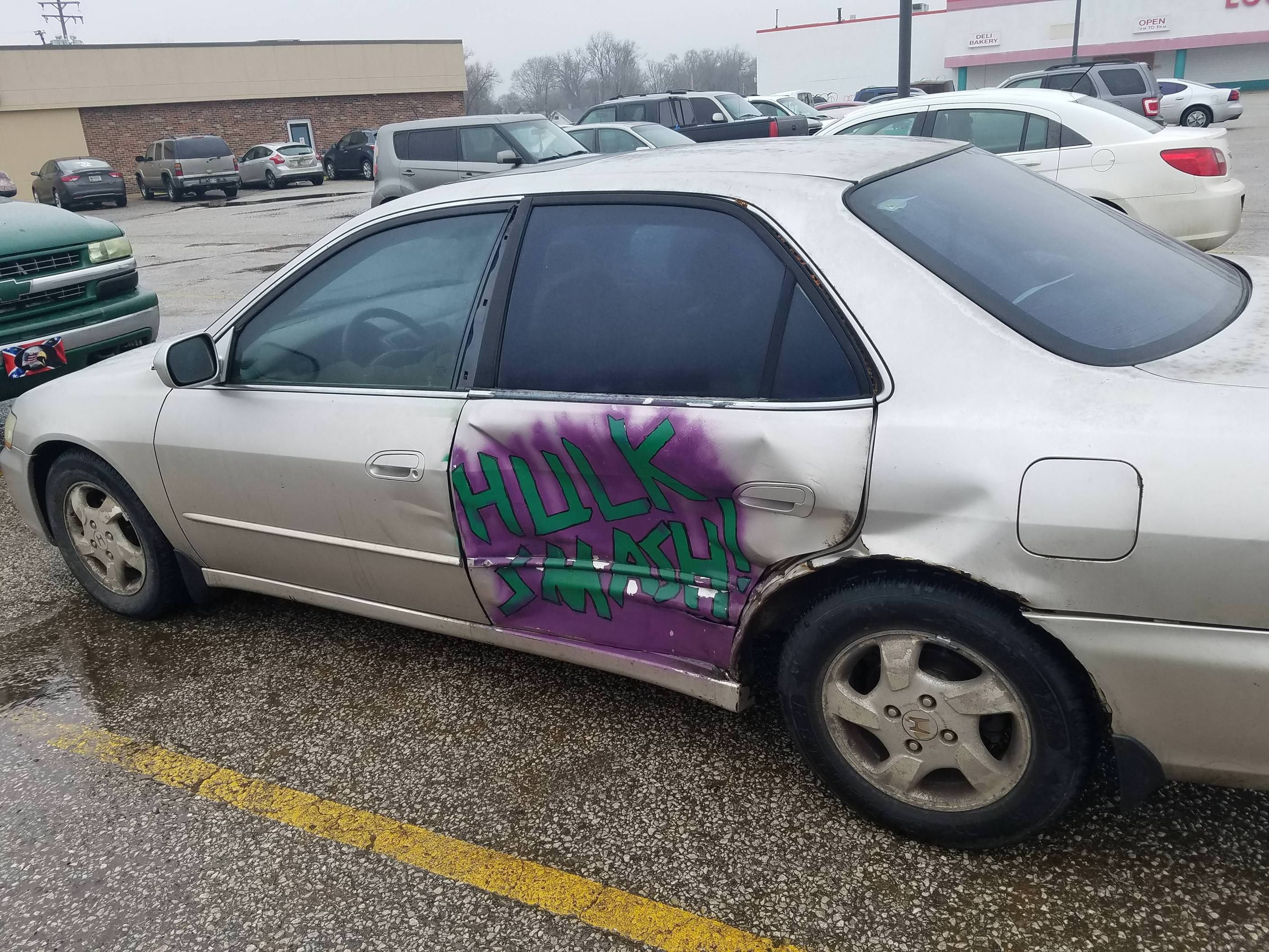 This person's awesome solution to covering up a large dent on their car.
