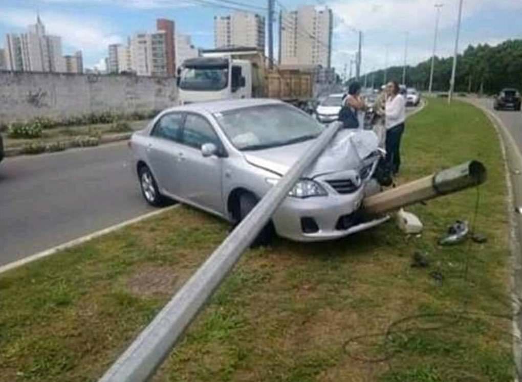 Toyota Corolla smoking and using a selfie stick