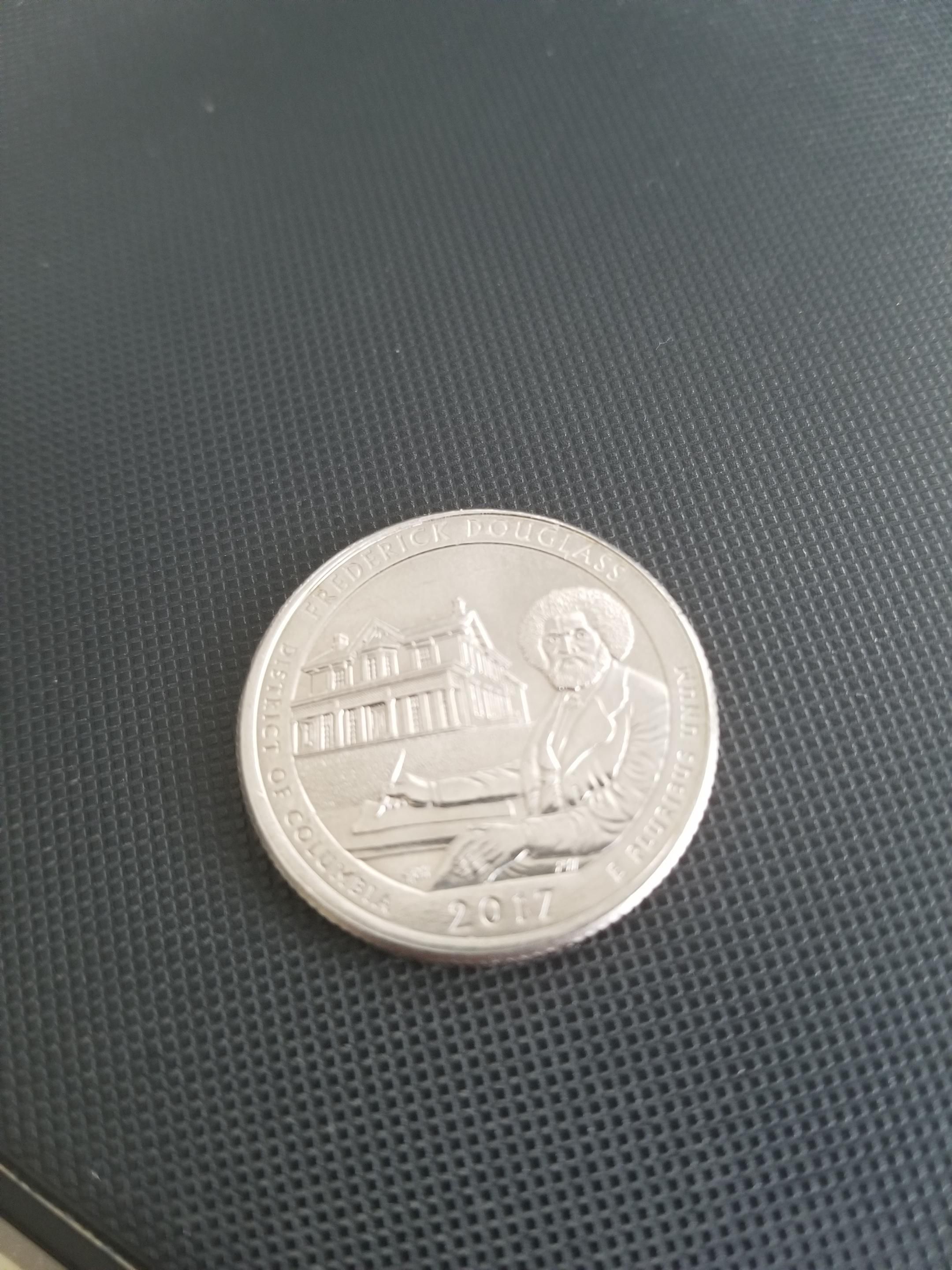 Totally thought Bob Ross got his own quarter at first glance