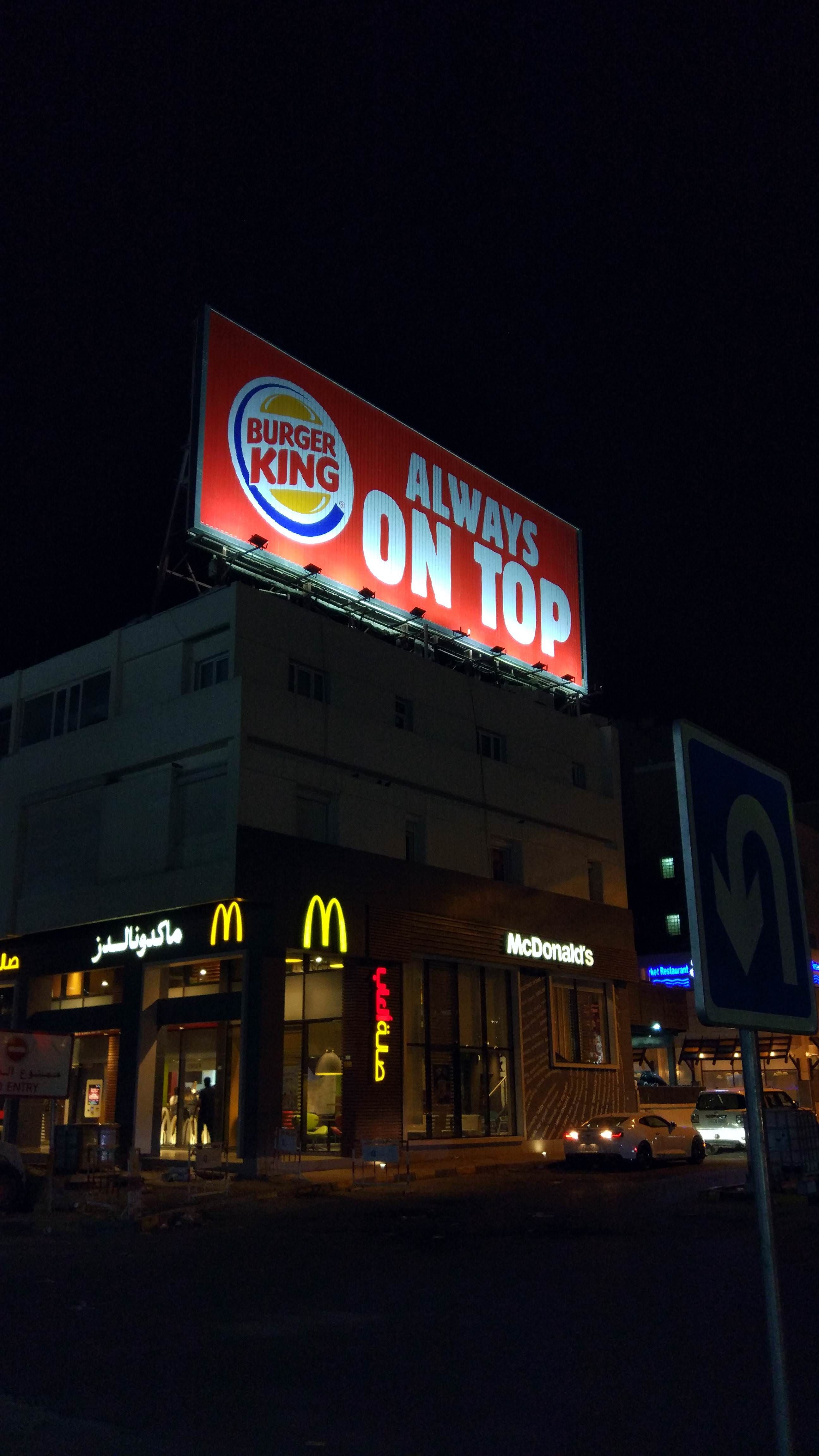 Just a Burger Kind ad on top of a McDonald's restaurant