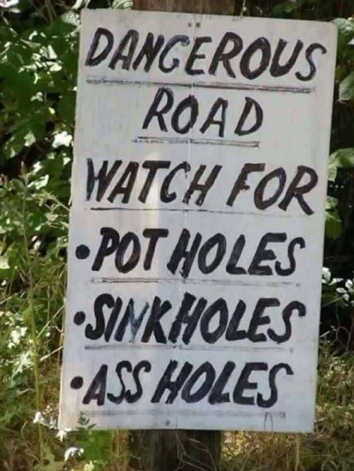 Caution!! Dangerous Road.