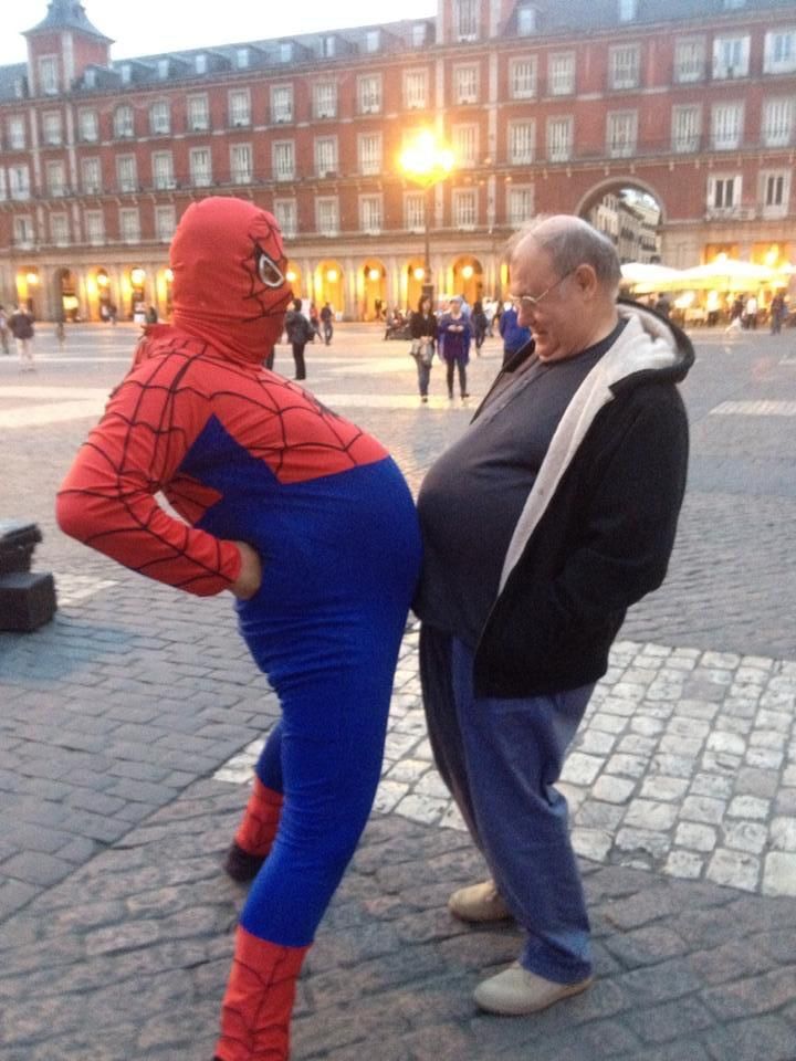 Chubby Spider-Man bumping bellies with my dad in Spain
