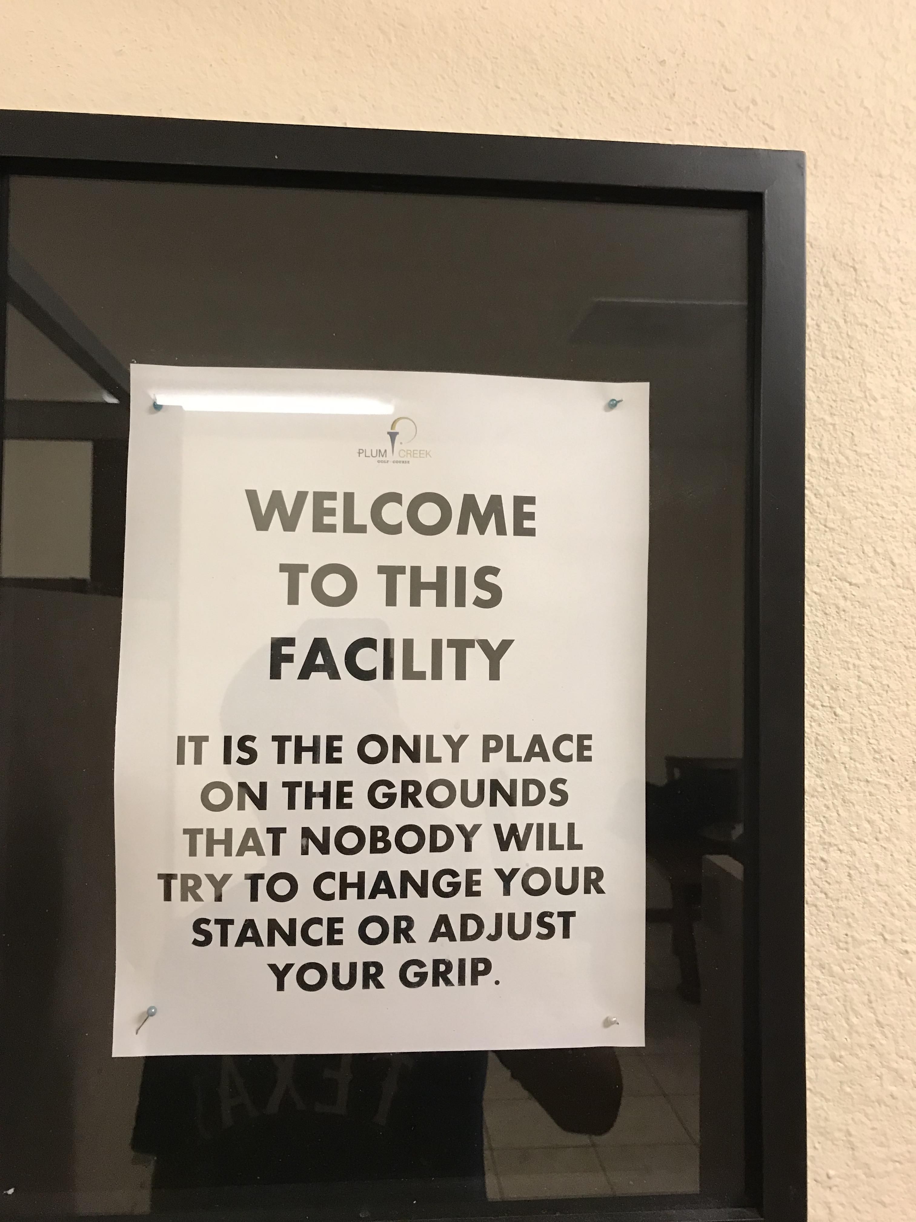 In the men’s restroom at the golf course