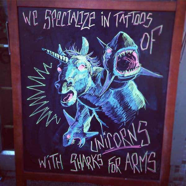 Sign in front of my local tattoo shop