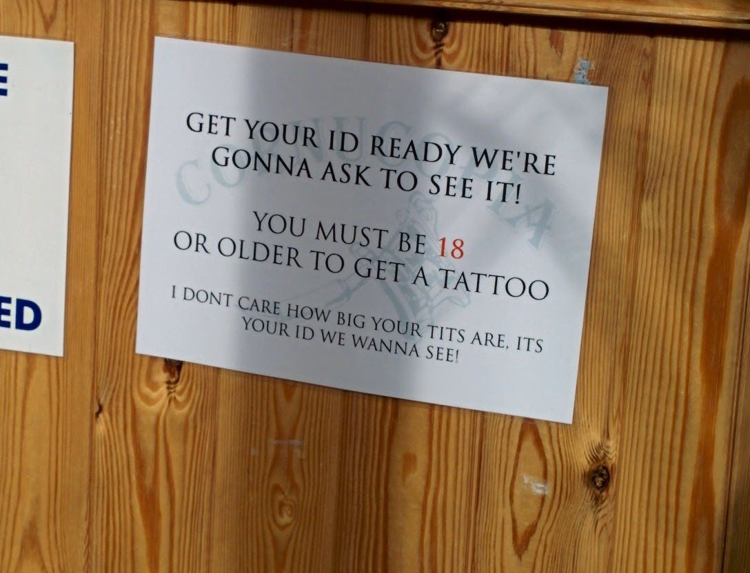 This Local tattoo studio has a sign at the reception counter...
