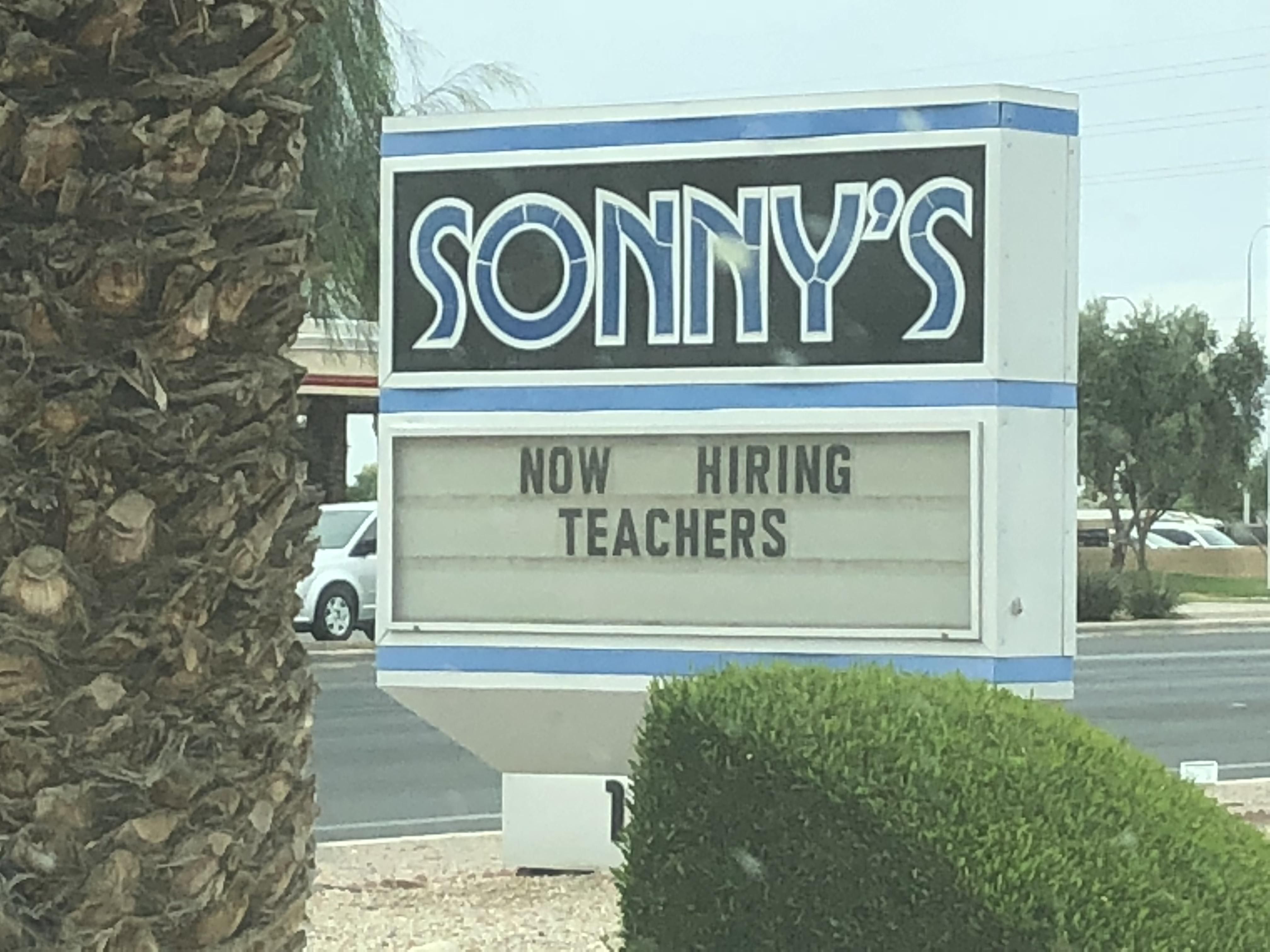 Sign at a Strip Club in Tucson, Az during the current Teachers Strike for higher pay wages.