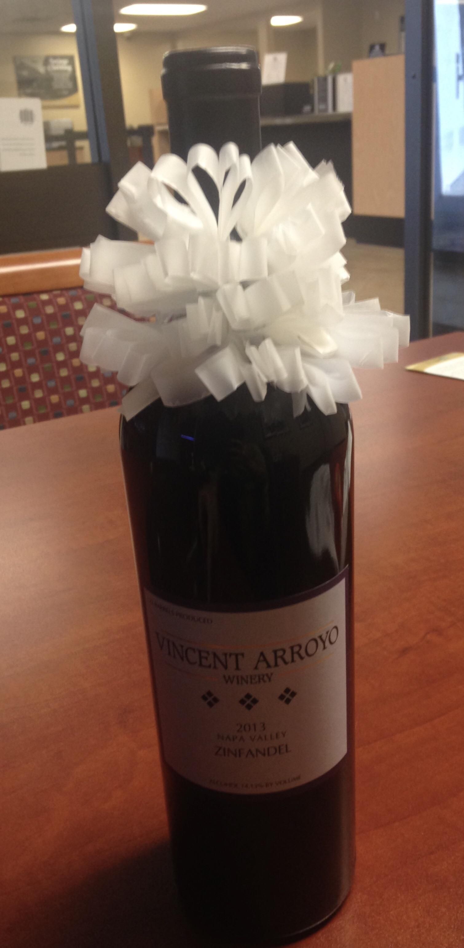 My boss HATES scotch tape and loves wine. This was my retirement gift for him