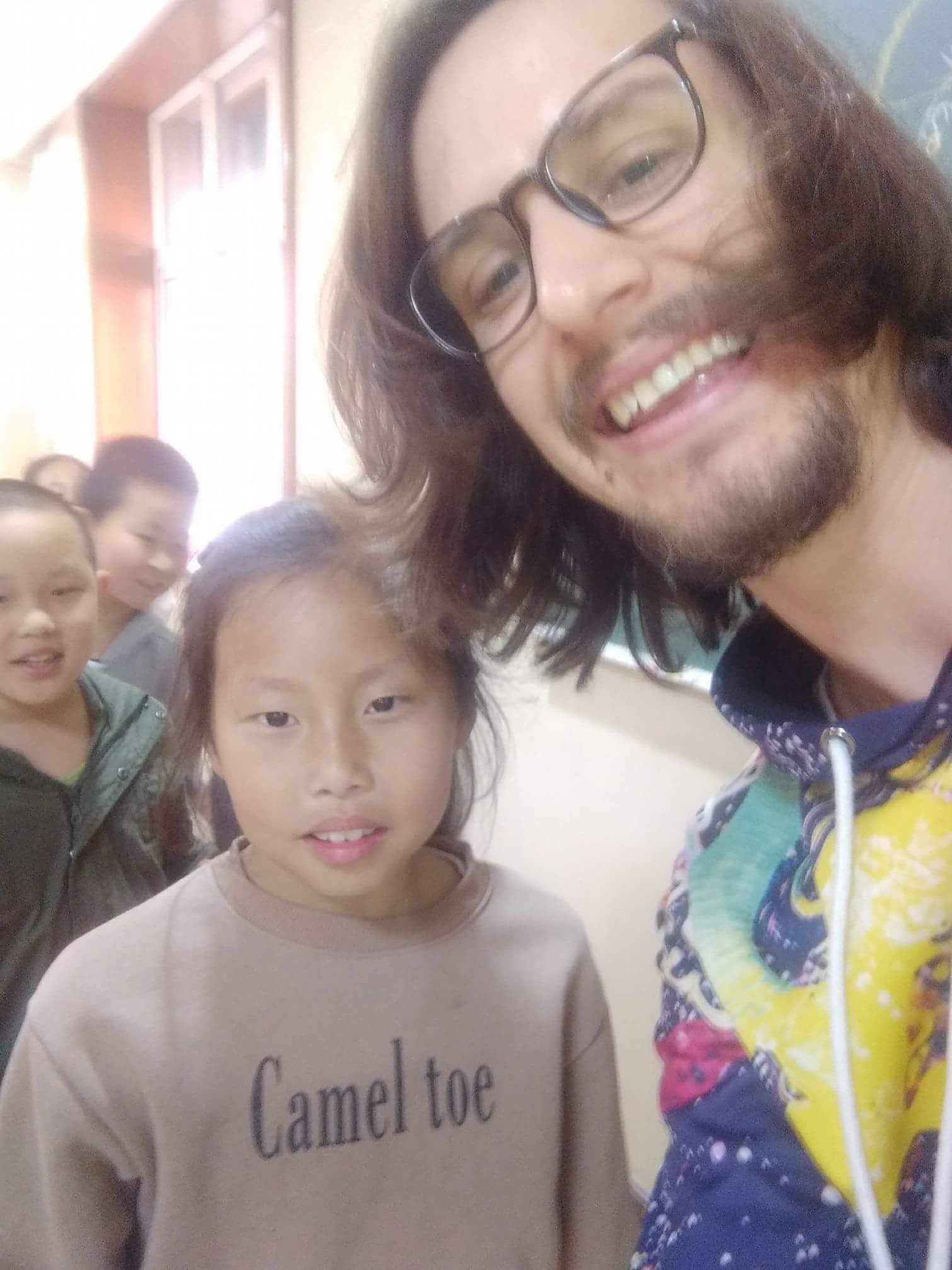 My Swedish friend teaching in China posing with his favorite student.