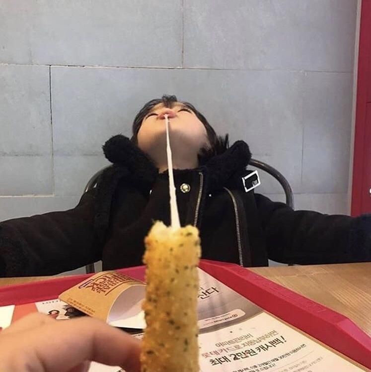 This kid knows how to eat mozzarella sticks