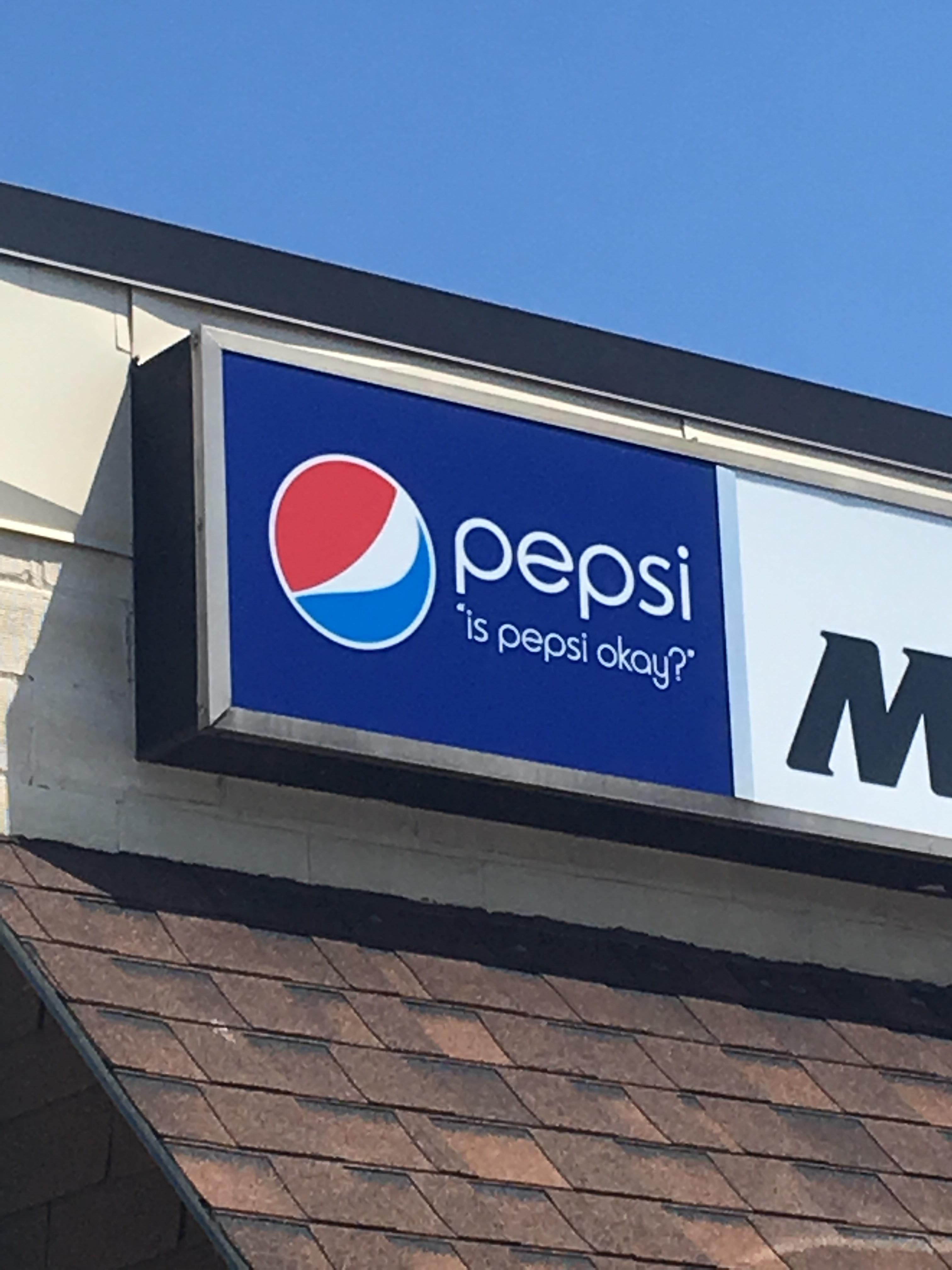 This Pepsi sign on a convenience store
