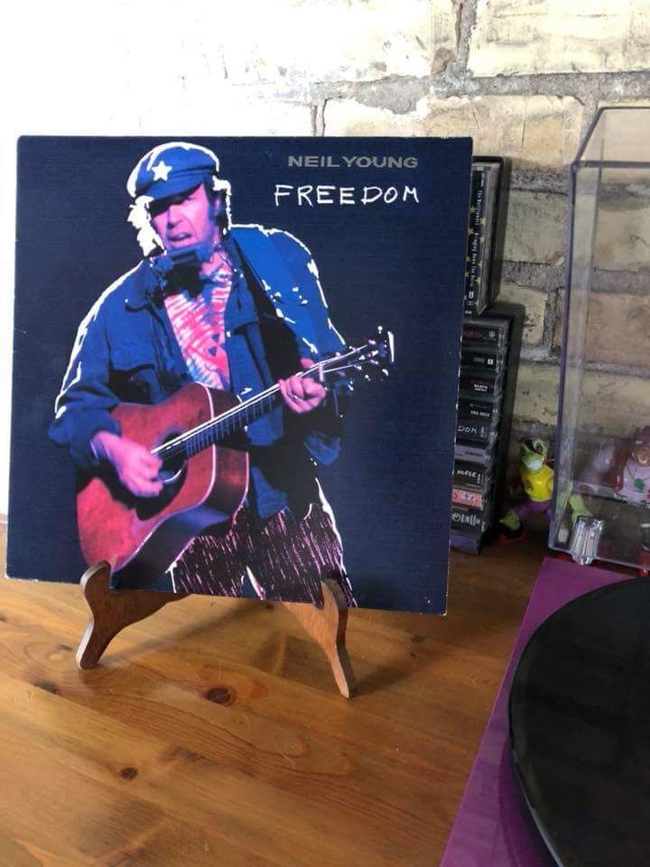 This record stand makes it look like Neil Young has peg legs