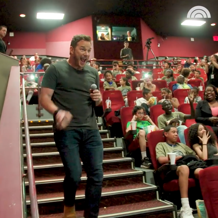 Chris Pratt surprises theater full of kids, but green shirt kid is not amused.