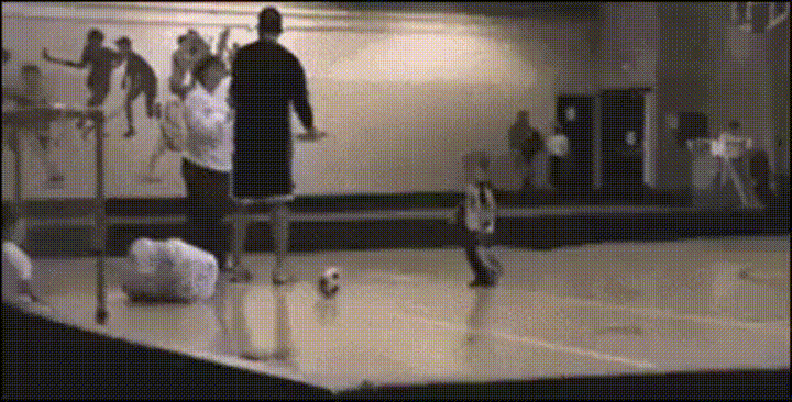 Extradimensional kid kicks soccer ball.