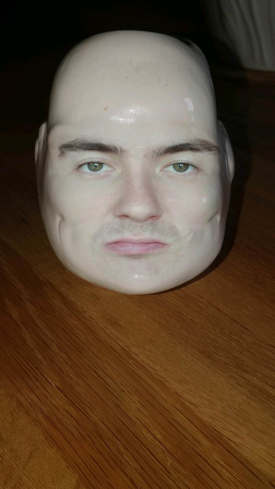 I did a face swap with a head-shaped table ornament.