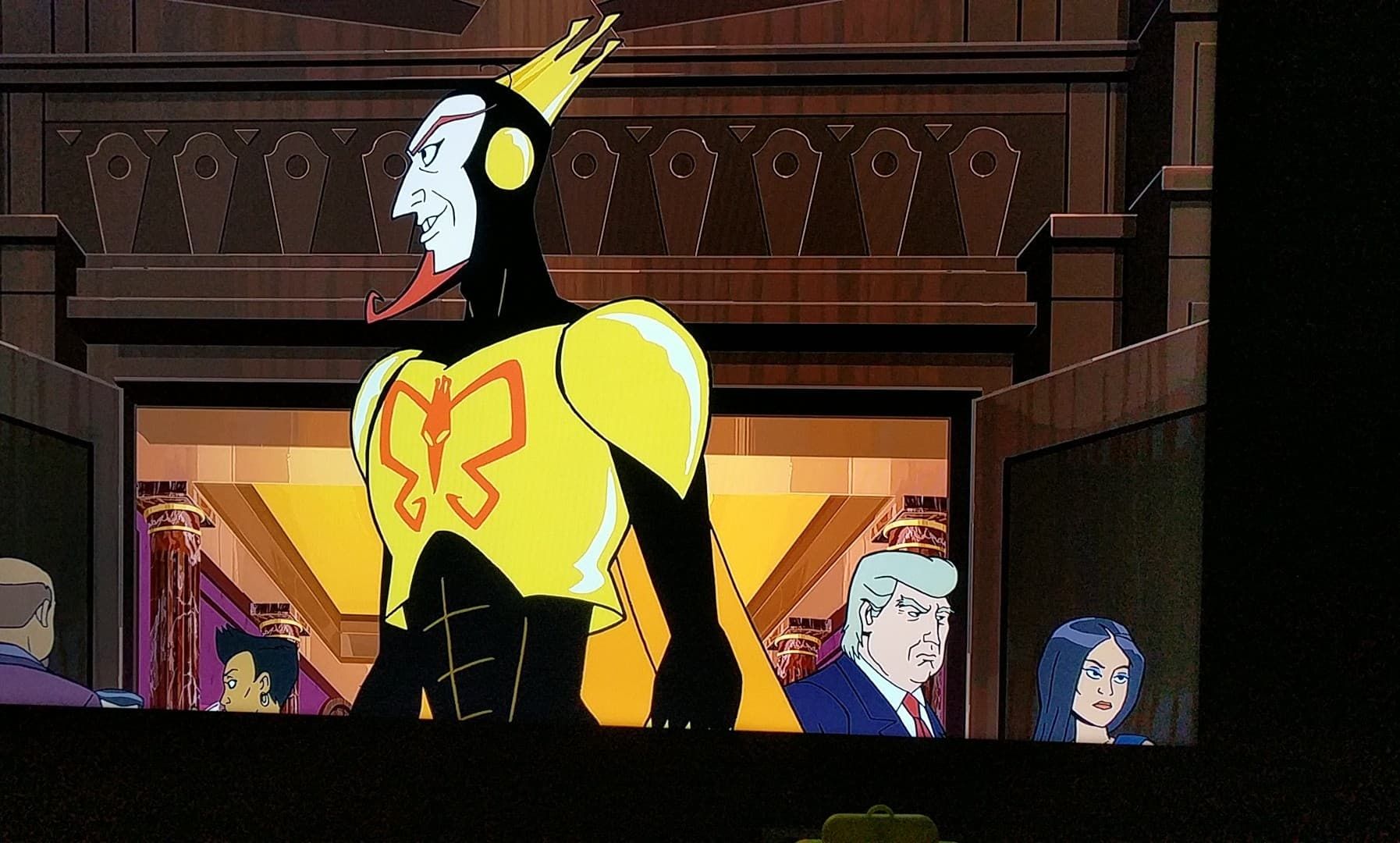 So i was watching season 6 of venture brothers and a seen came up where there was a Gathering of villains and i noticed something in the background.