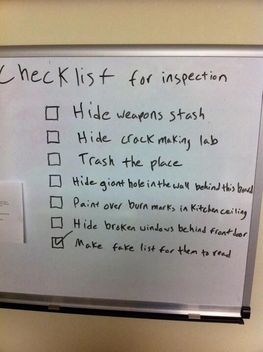 This checklist on a white board for an apartment inspection.