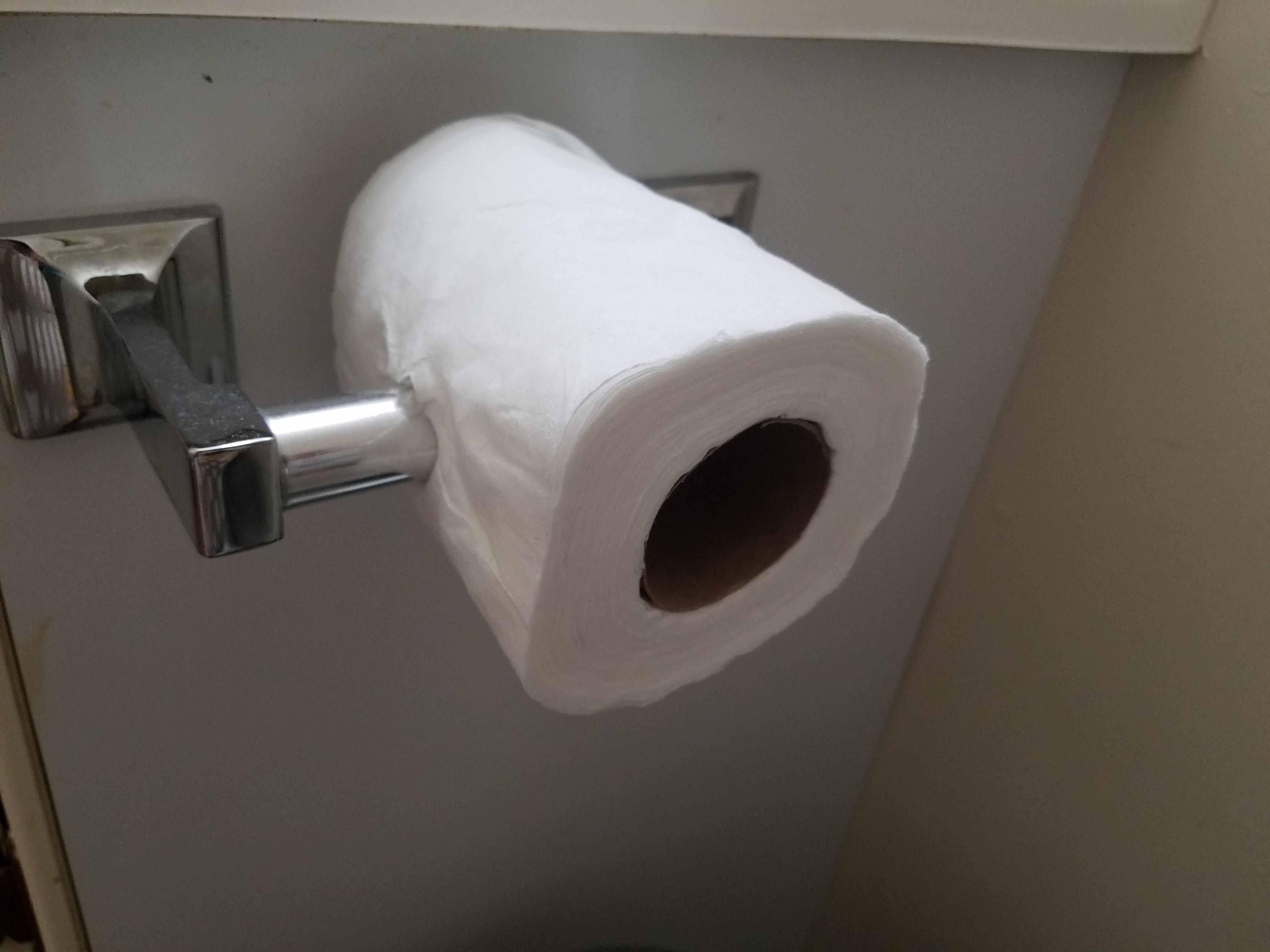 My wife keeps putting the roll on backwards. I responded.