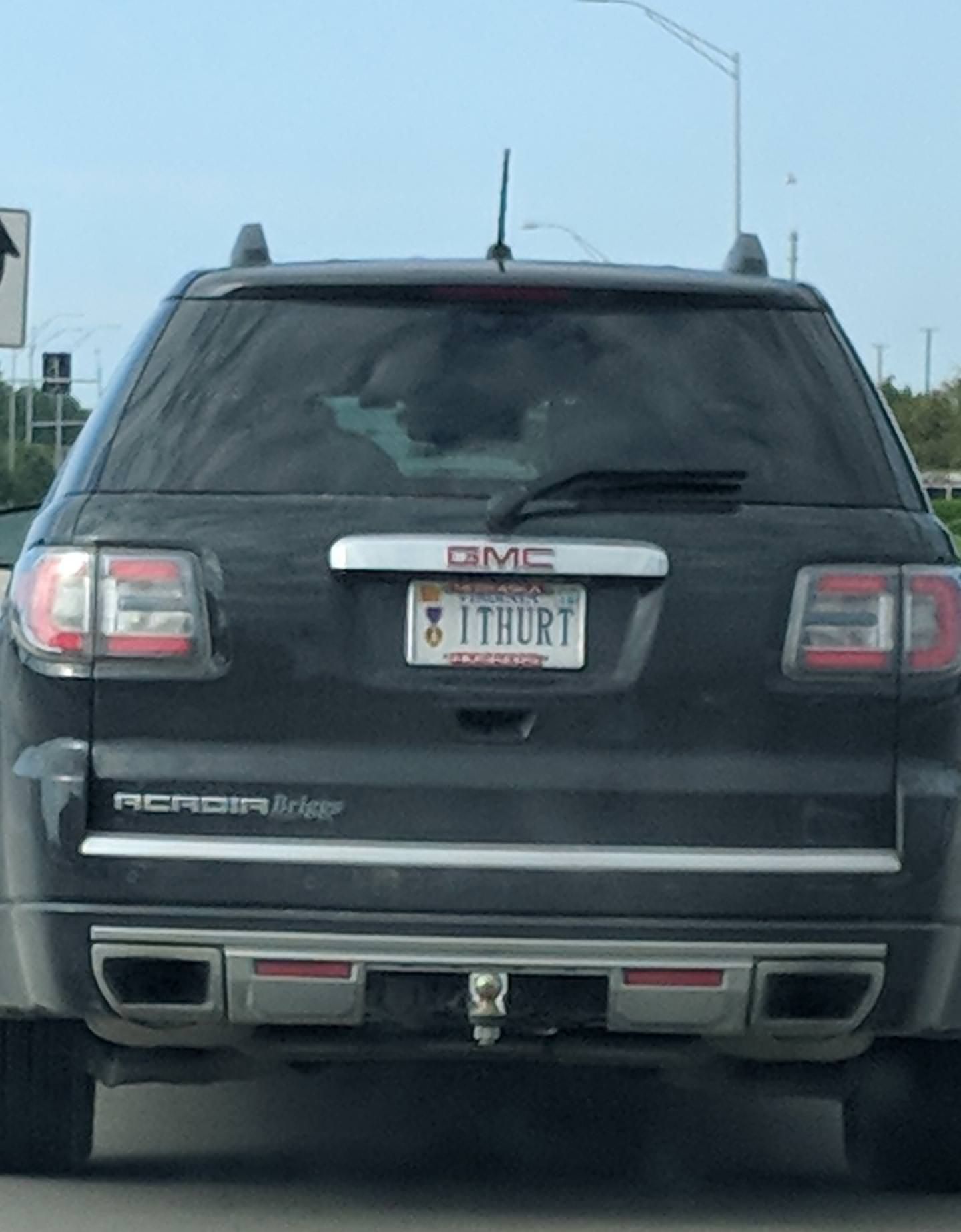 Saw this license plate with a Purple Heart on it...