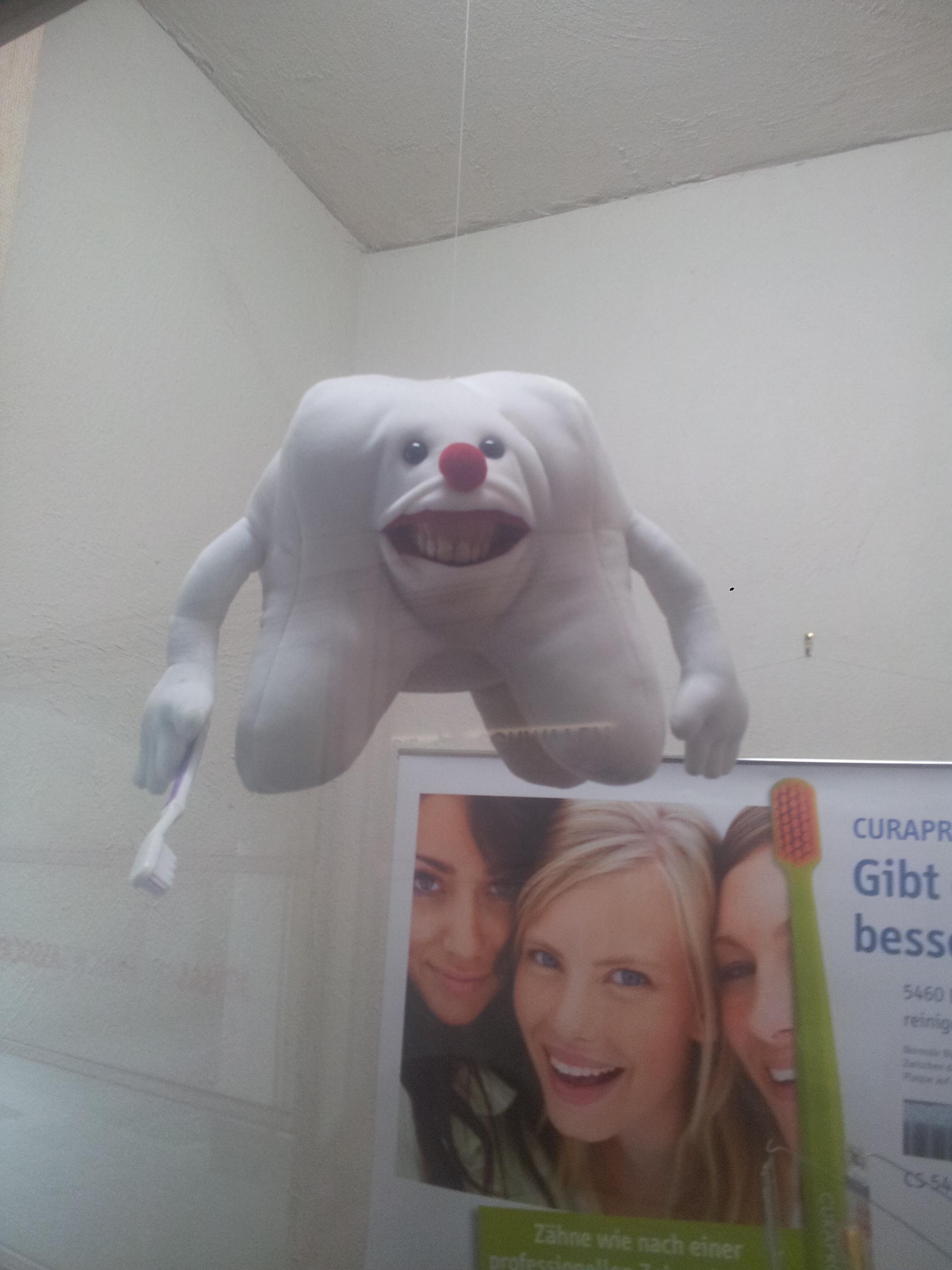 Saw this weird dentist mascot today... Creeped me out.