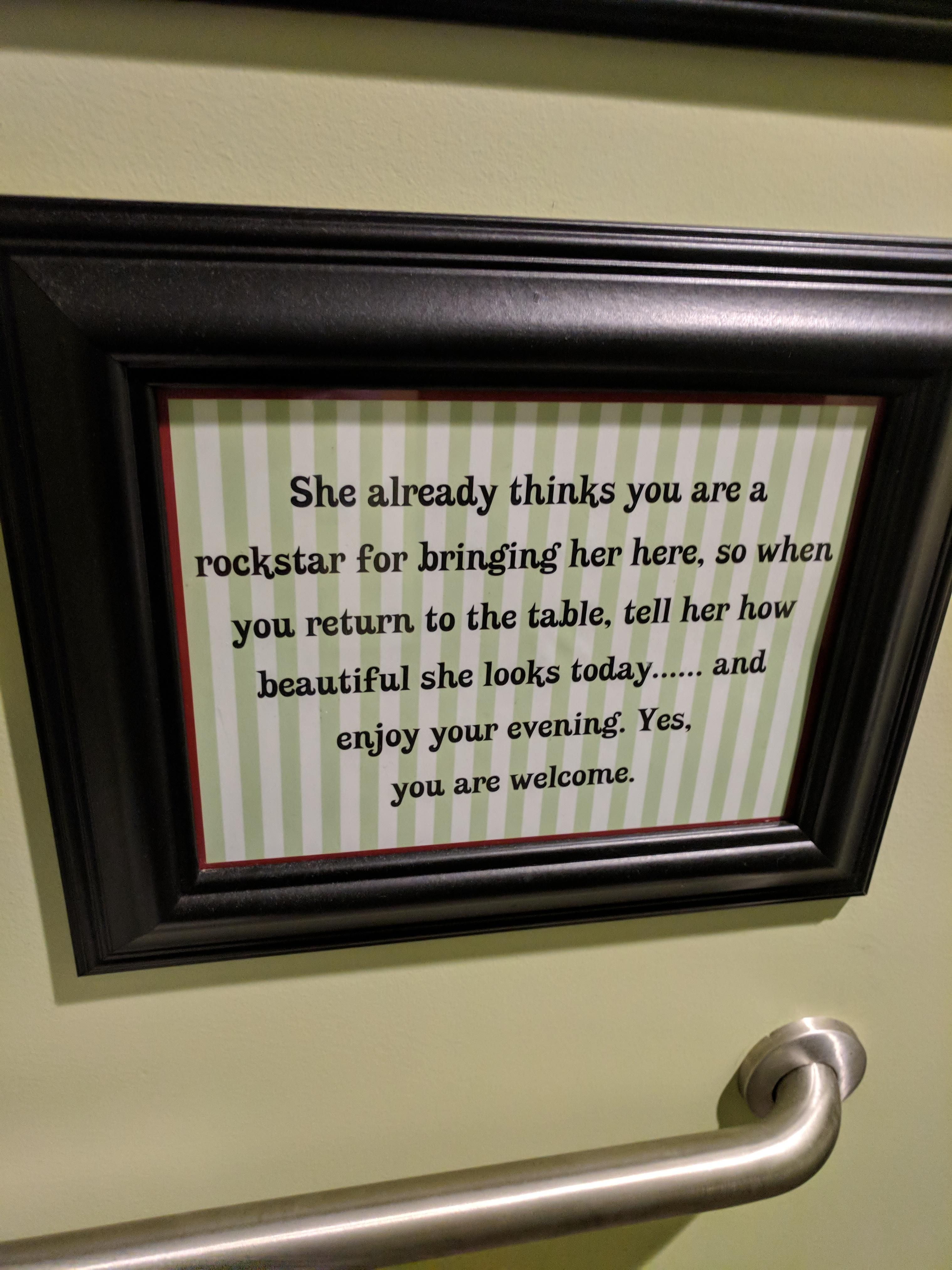 Taking relationship advice from the men's restroom.