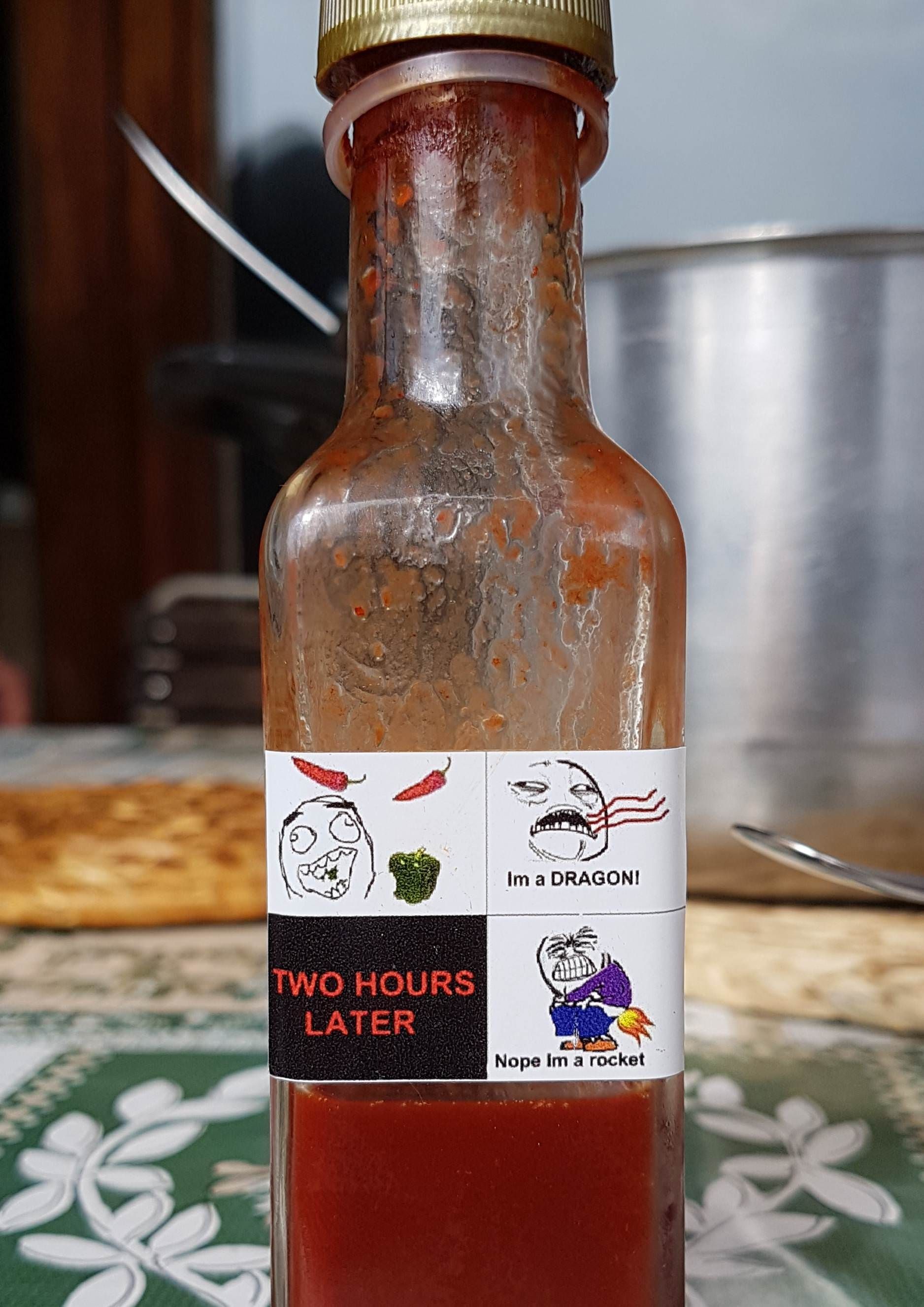 My dad made a hot sauce and this is how he labeled it!