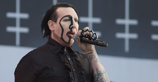 Marilyn Manson looks like Nicholas Cage dressed up as Marilyn Manson.