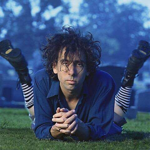 In This Photo Tim Burton looks like a cracked out Nicholas Cage