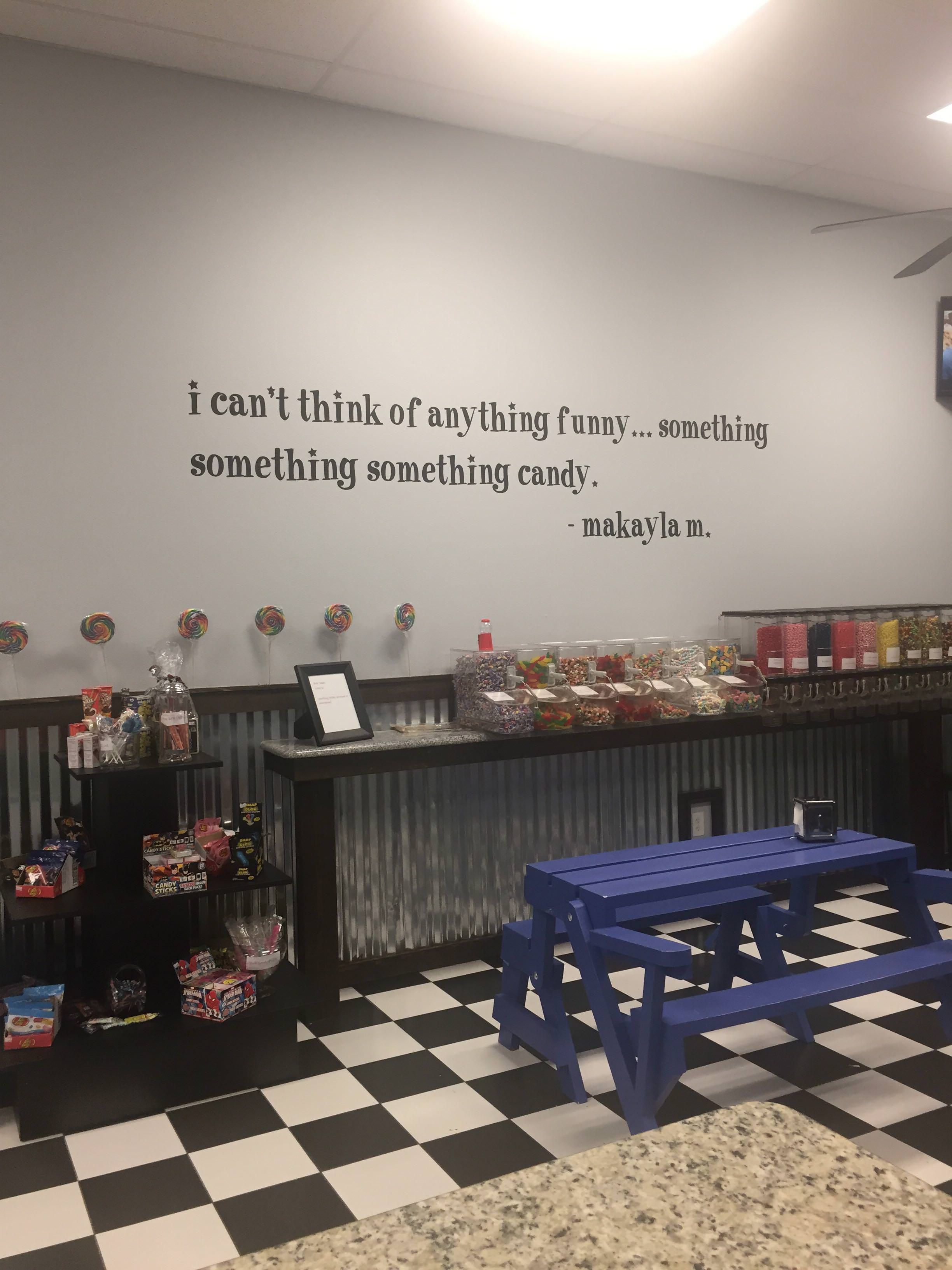 We opened a candy store and I asked my 7yr old daughter for a fun quote about candy