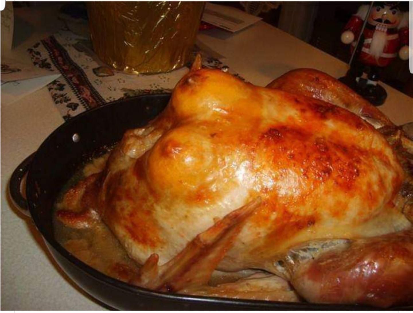 Cut a lemon in half place it under the skin of the turkey to lighten up the holiday.