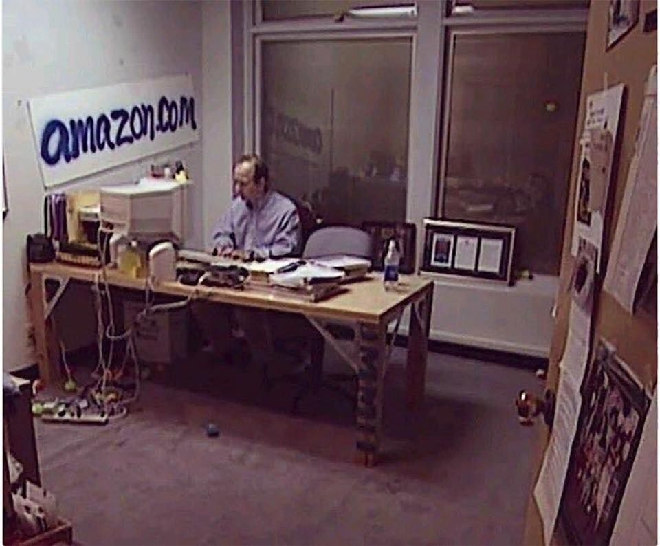 A photo of Jeff Bezos In his office during the early days of Amazon, 1999