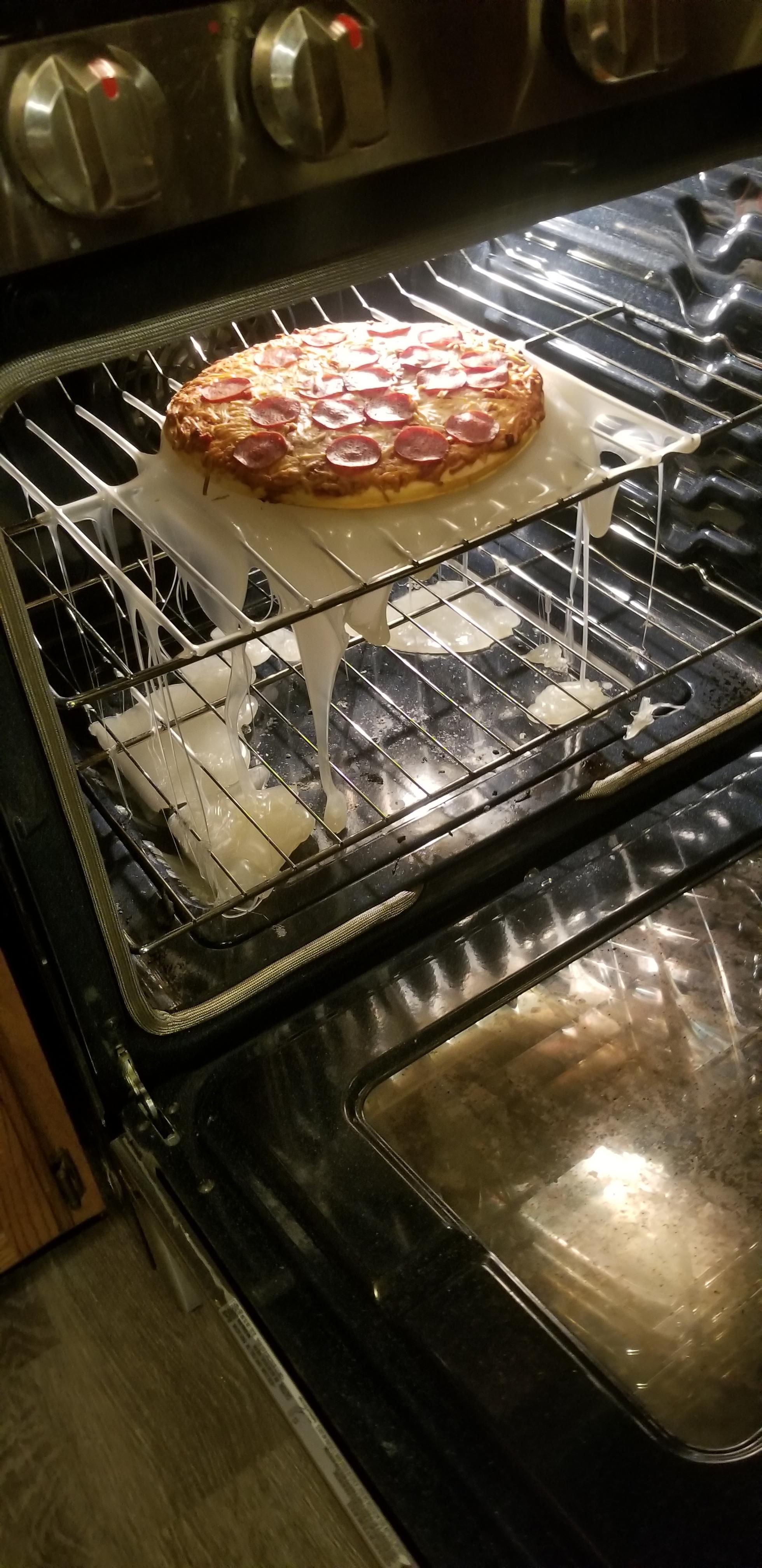 My daughter used a plastic cutting board for a pizza pan.