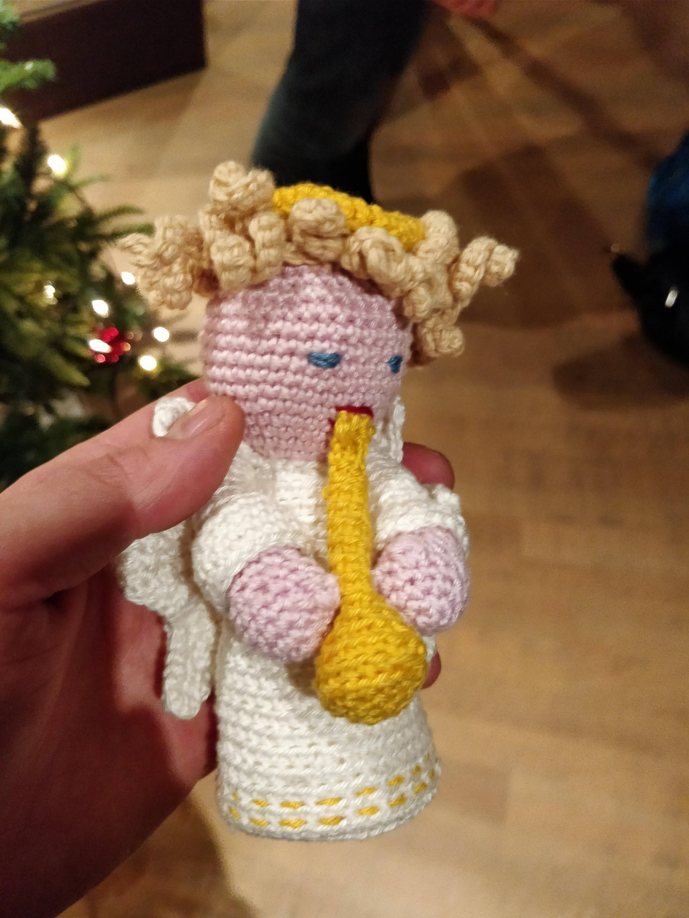 This Xmass ornament my aunt made looks like an angel taking a bong hit.