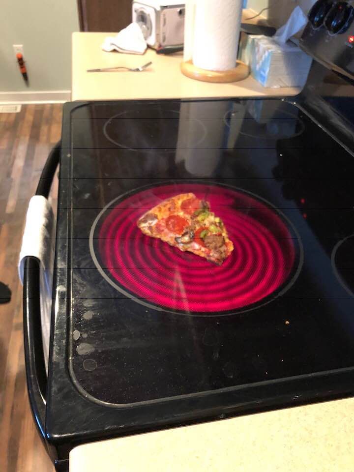 I suggested to my college kid reheating pizza on the stovetop. Didn't think I needed to specify "in a pan."