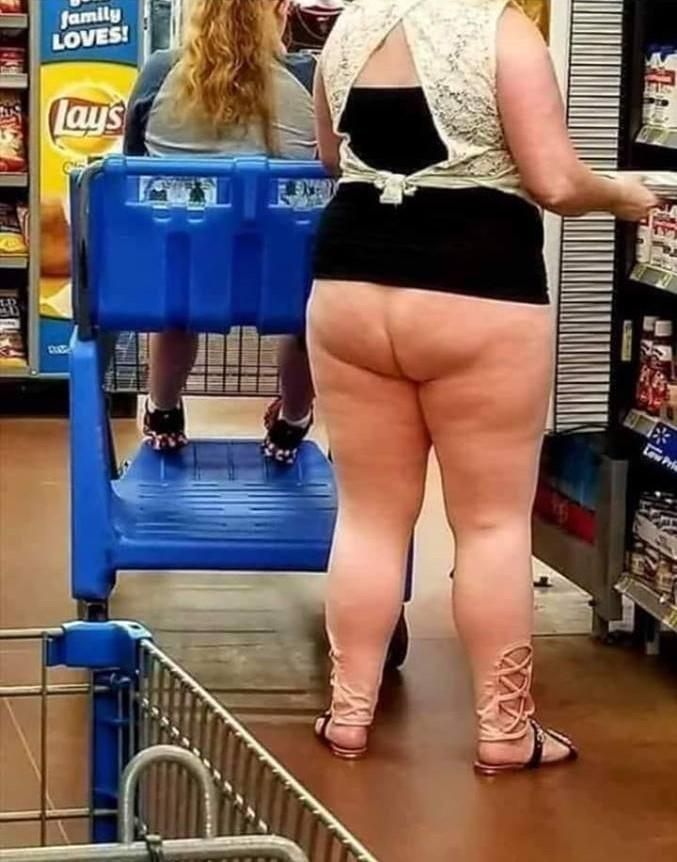 I was so distracted by the pants, didn't even notice the 186-month old 'baby' in the cart