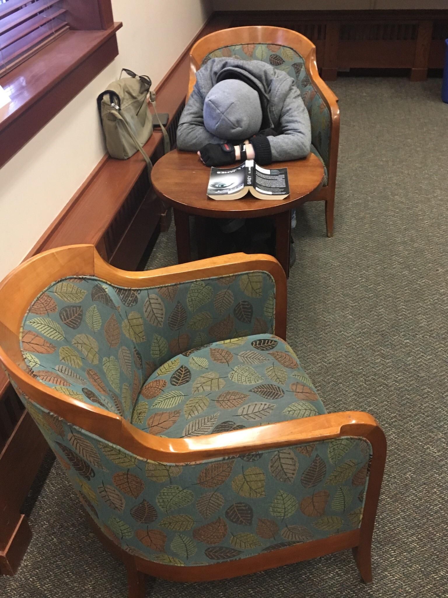 My roommate fell asleep at the library so I put 50 Shades of Grey in front of him