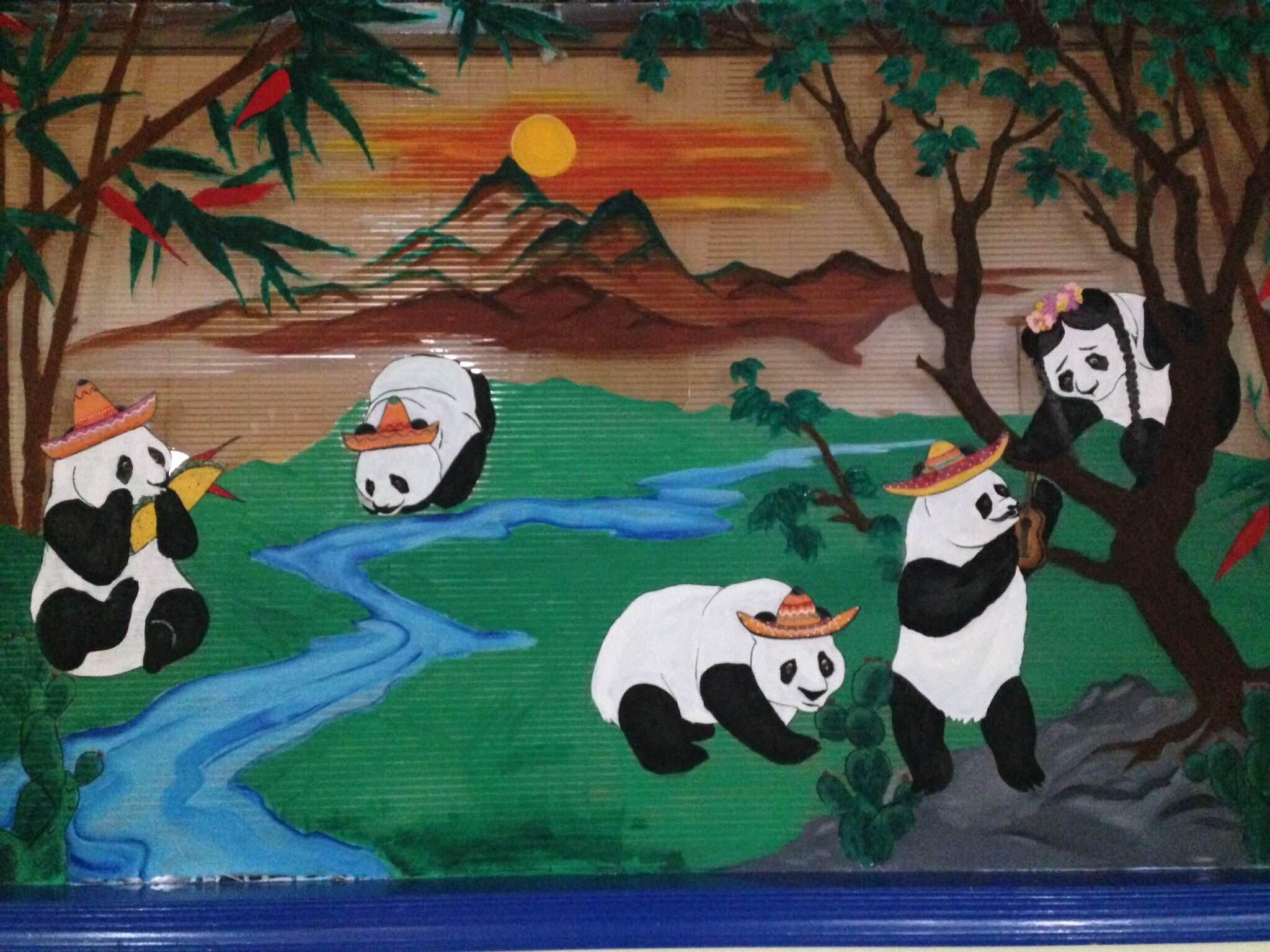 This Mexican restaurant used to be a Chinese restaurant so instead of painting over the pandas they just put sombreros on them