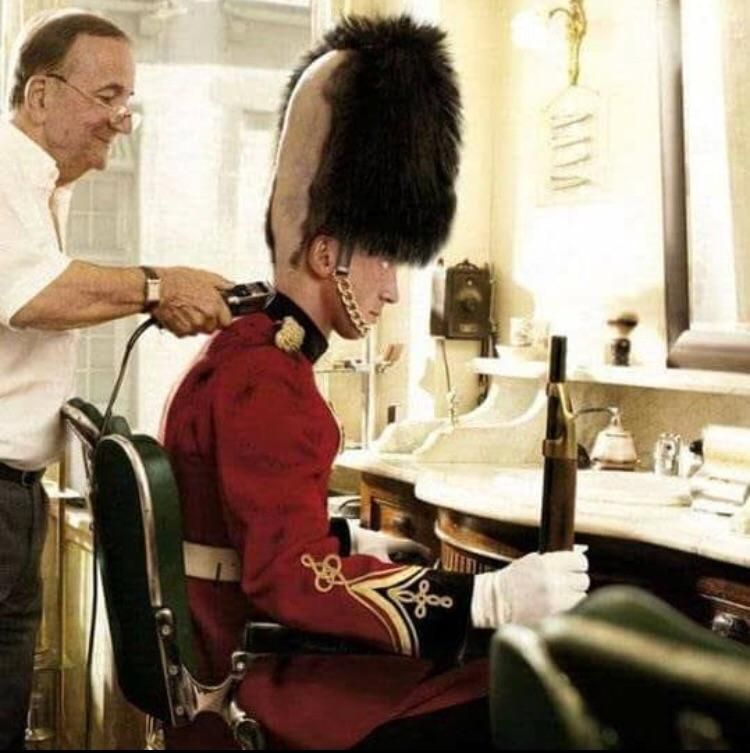 Queens guard getting a haircut