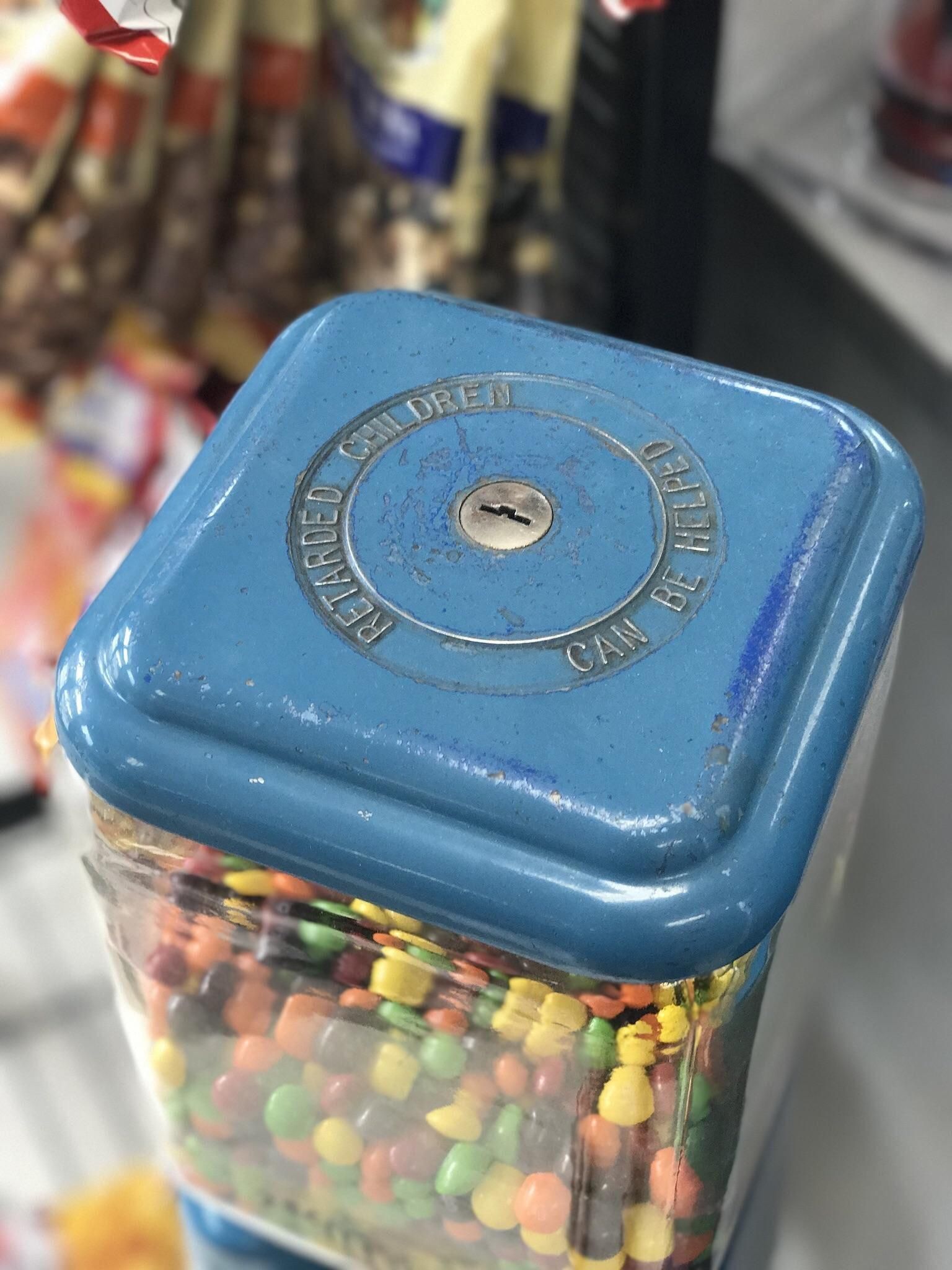 The message on this candy machine is a bit... dated