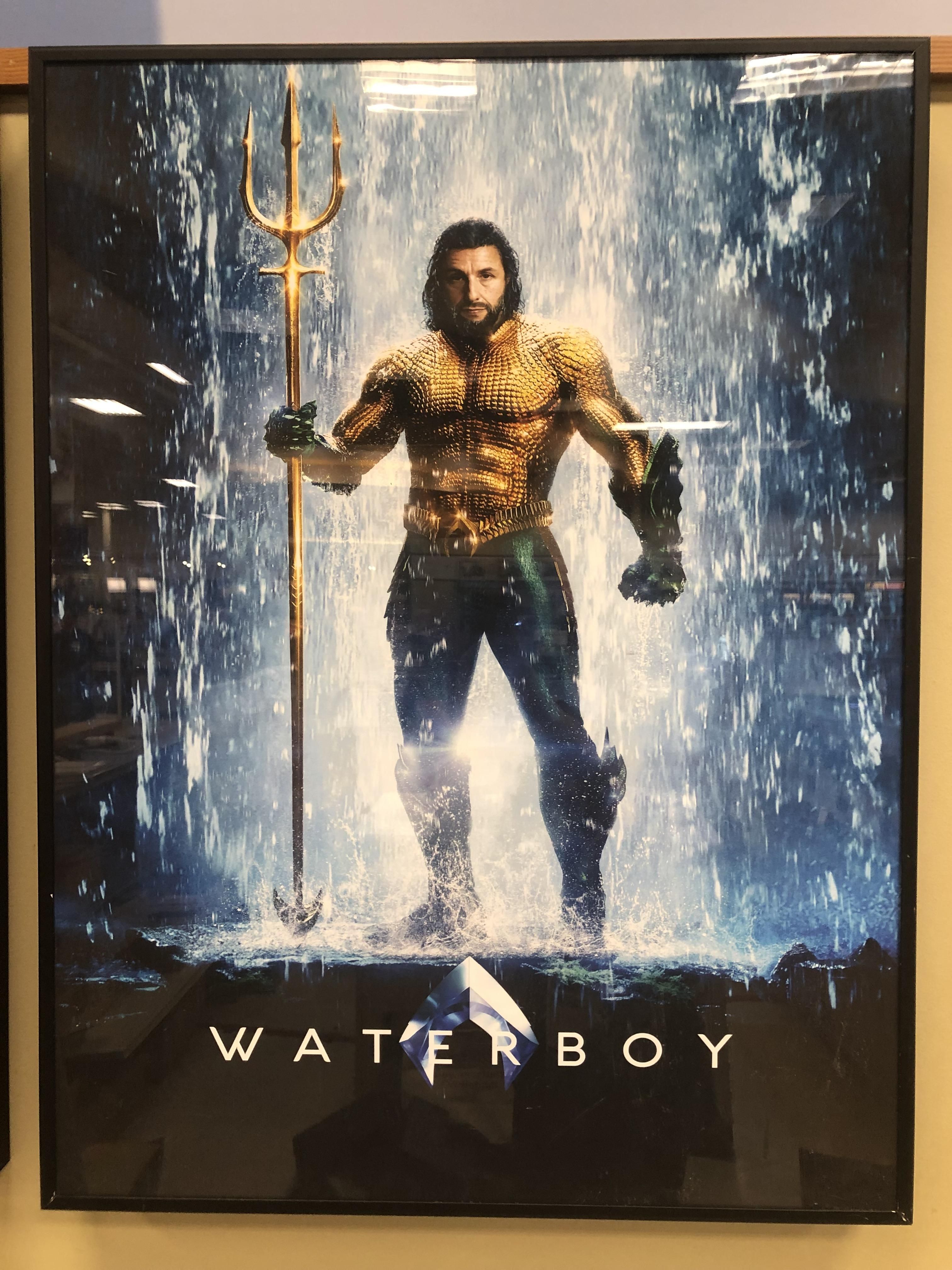 My coworker changed up the Aquaman poster today.