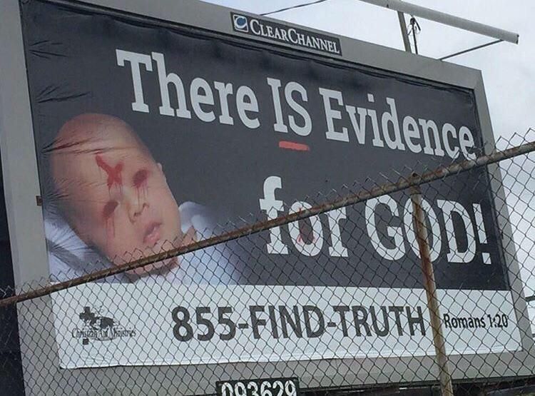 Someone has been defacing these billboards in my town