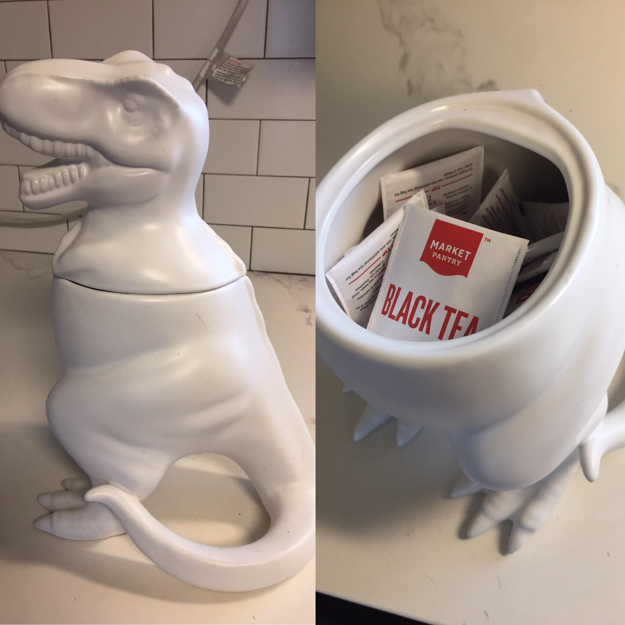 My girlfriend has decided to repurpose our novelty cookie jar. Say hello to our Tea-Rex.