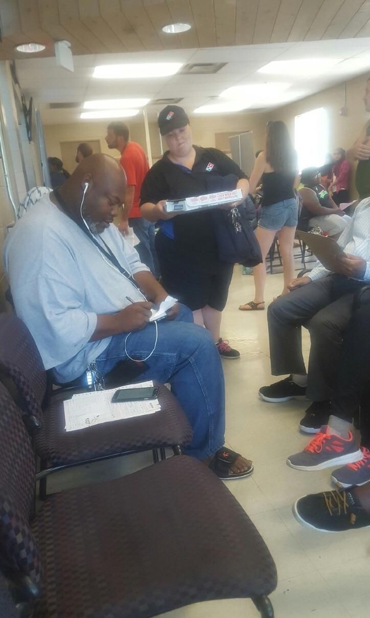 Dude at the DMV got bored because of the long wait and ordered pizza