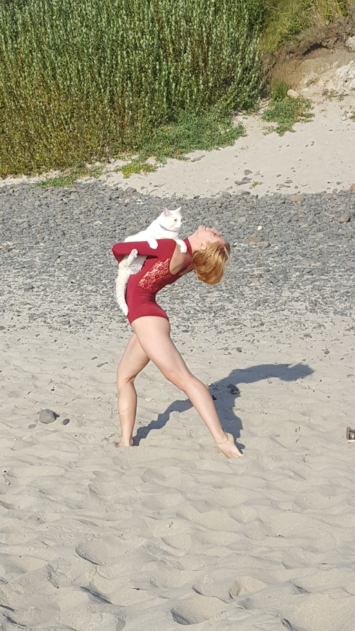 We took my cat to the beach and there happened to be a professional dancer having a photo shoot. Obviously this happened because Buns' day wasn't confusing enough.