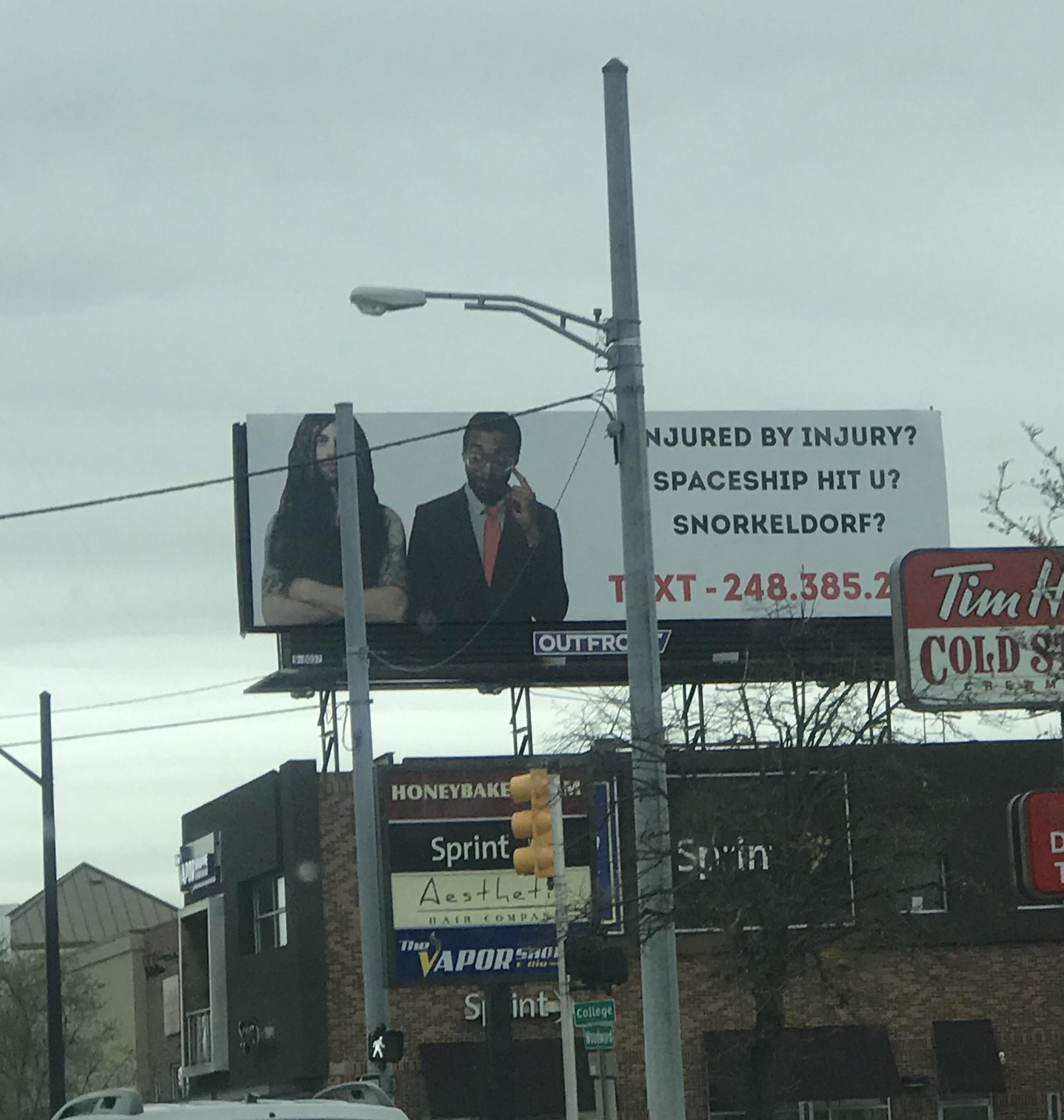 Someone put up this billboard making fun of all of the injury lawyers in Detroit.