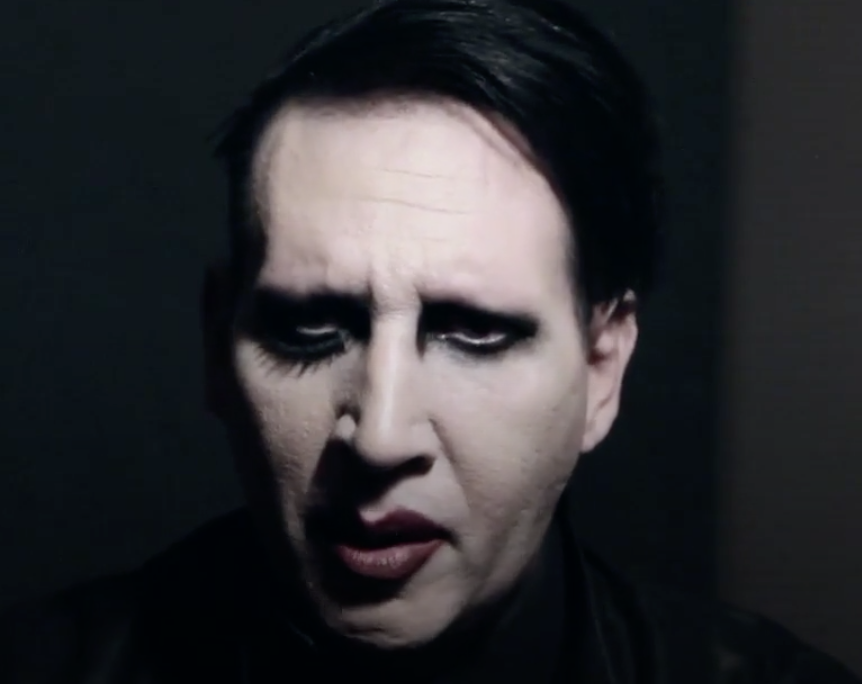 Ageing Marilyn Manson looks like Nicholas Cage playing the Joker in a Burton movie
