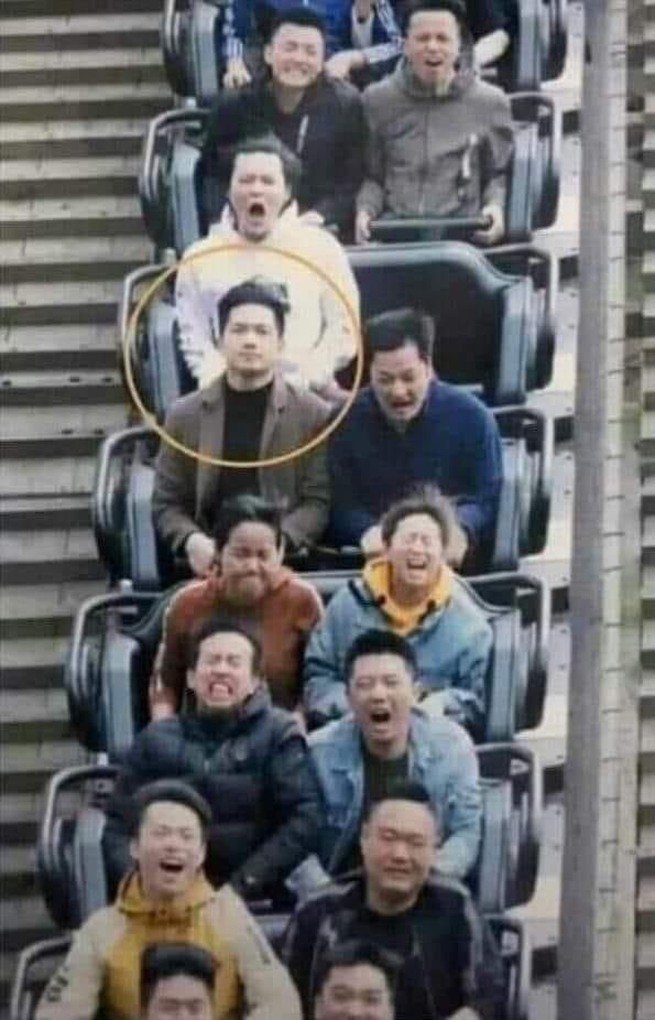 Picture of my fighter jet pilot friend on a roller coaster.