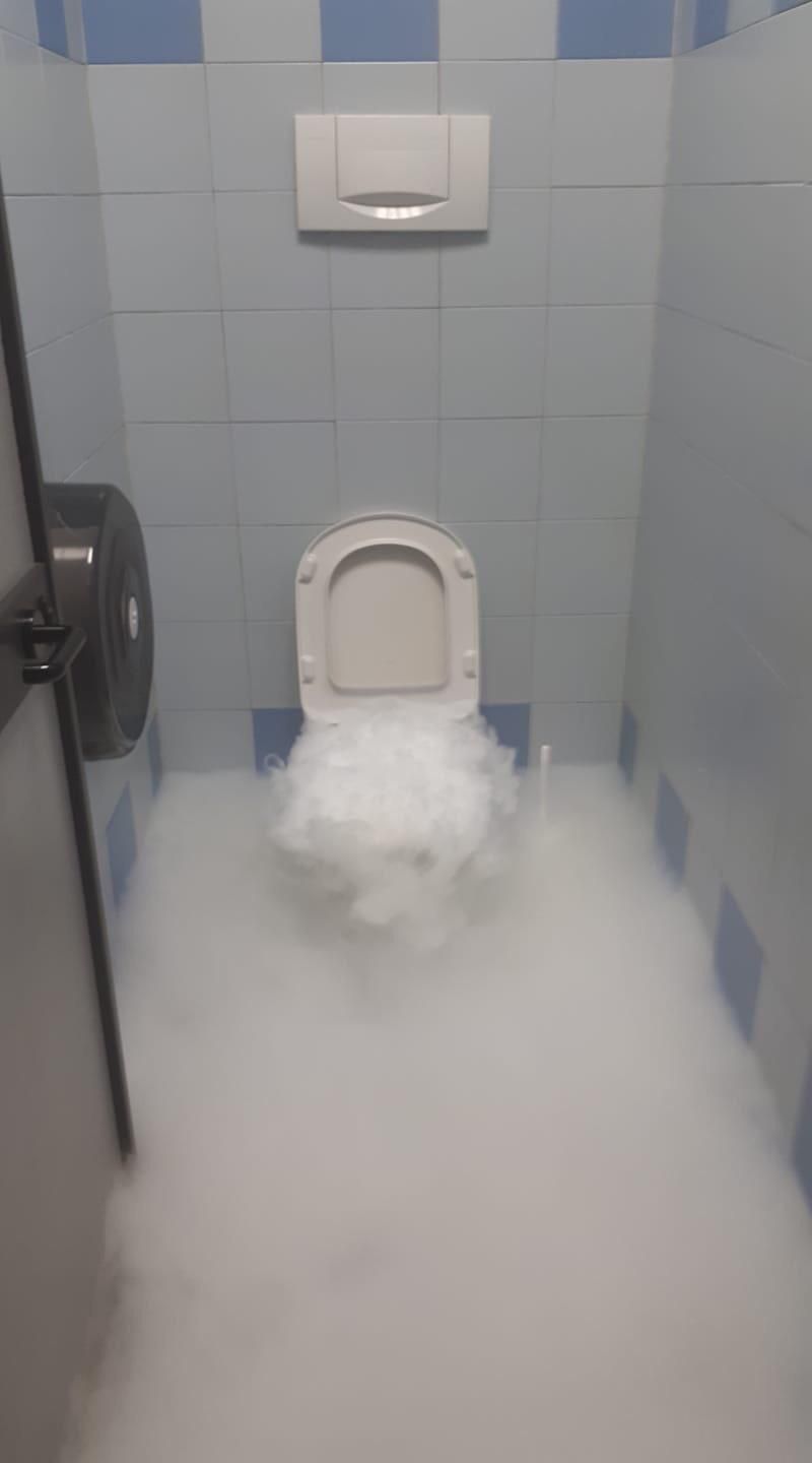 Someone at my stepdads work put dry ice in the toilet by mistake.