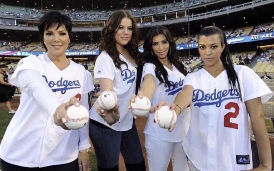 The Kardashian’s holding white balls for the first time.