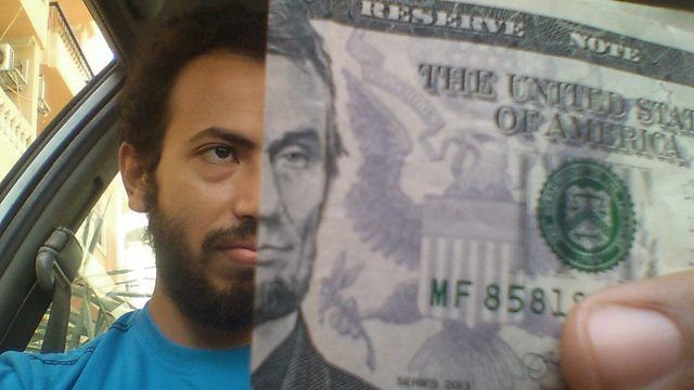 Was bored at the car,Tried to match my face to abe lincoln on the 5$ bill and it WORKED !